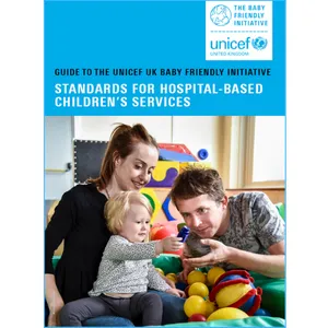 Son, mother and father playing in a health service