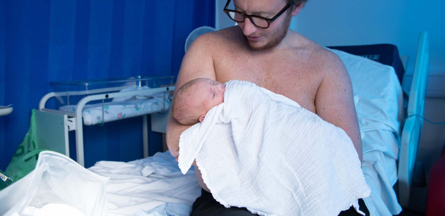 Dad in skin-to-skin with newborn