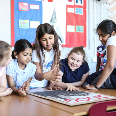 A group of children learn about air pollution at a Rights Respecting School