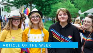 group of young girls posing on a Pride event