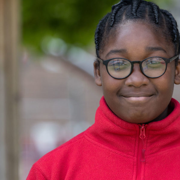 A girl smiling at a camera
