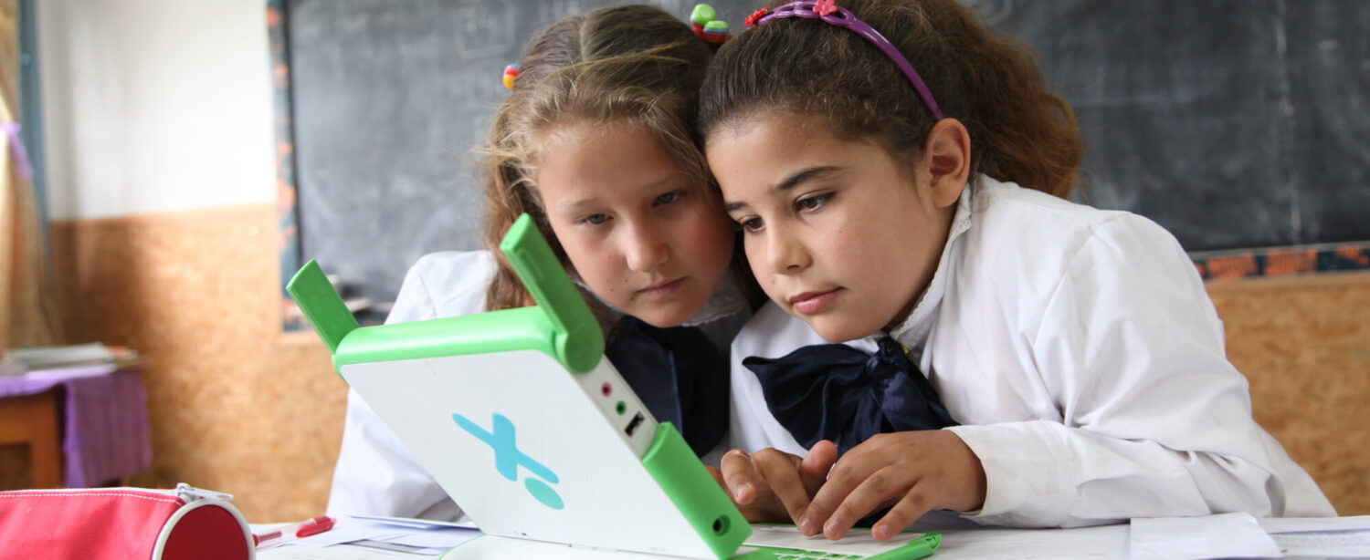 Alison, 8, and Roclio, 9, use a special laptop at a rural school in Uruguay. We are working with the government to promote digital inclusion in order to reduce the digital divide between rural and urban. Unicef/2013/Pirozzi