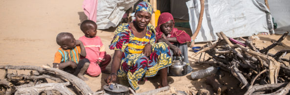 Binta prepares a meal for her family outside their tent shelter in Chad. Unicef 2015 Cherkaoui