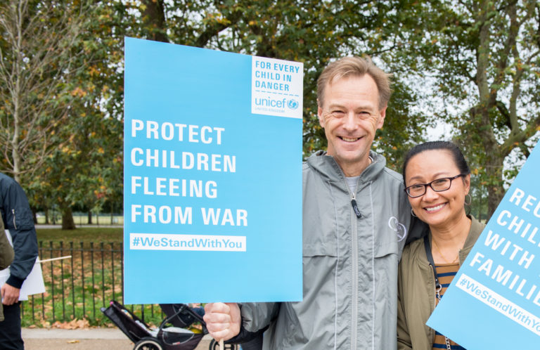Campaigners Duncan and Jum at the Welcome Refugees march in September 2016. Unicef 2016 Fields