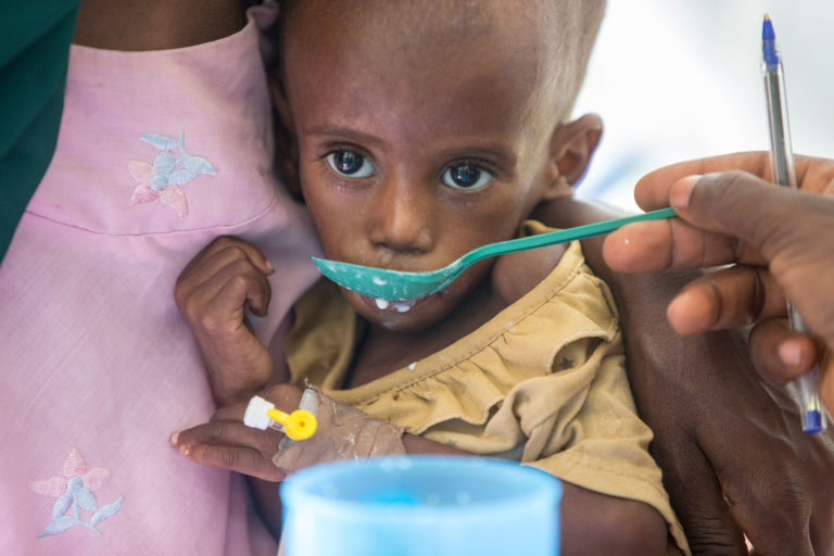 On 7 December 2016, Khadija, 1, receives treatment for severe malnutrition at a emergency paediatric unit in Maiduguri, Nigeria. Pictured with mum Fatima.