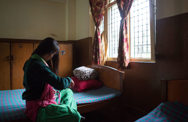 16-year-old Maya in the dormitory at Maiti Neal, a centre for young people who've been rescued from trafficking. Photo: Unicef/2017/Matas