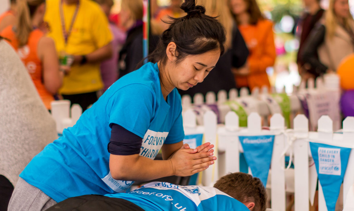 A well-deserved post-race massage for Team UNICEF runners after the Royal Parks Half Marathon. Photo: Unicef/2017/Tsang