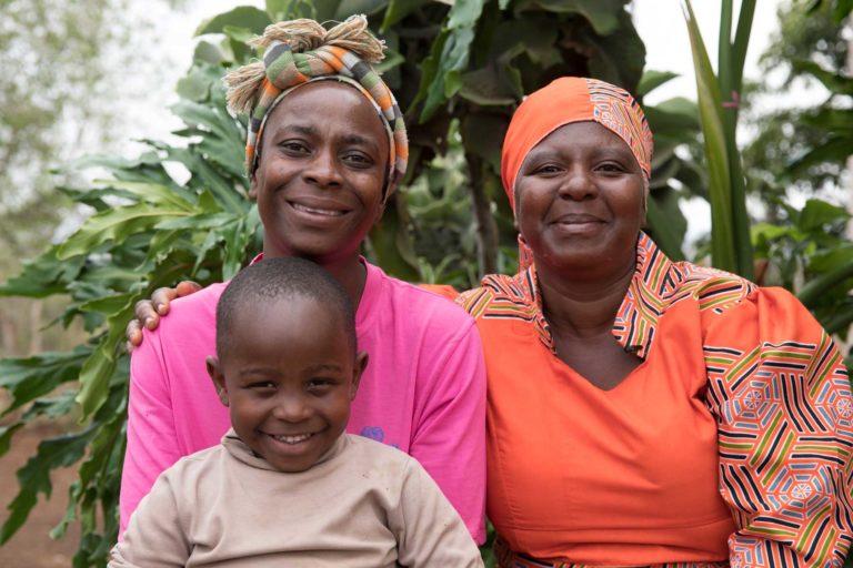 Nkosingivile,3, was born free from HIV thanks to the support his mother Philile (right) received from Unicef-trained community healthworker Zodwa. Photo: Unicef/2017/Matas