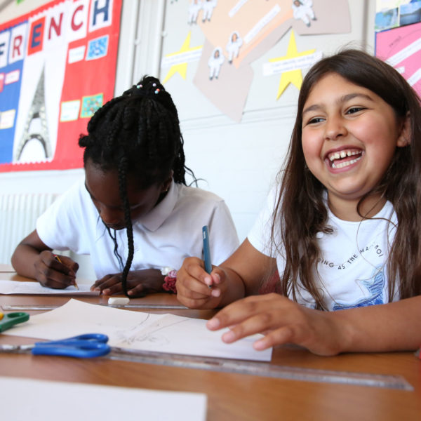 Children draw how the world would look if air pollution continues on one half and how the world would look without air pollution on the other half. We want every child in the UK to grow up breathing clean and healthy air to ensure they have the best opportunity to live a happy, healthy life. Photo: Unicef/2018/Dawe