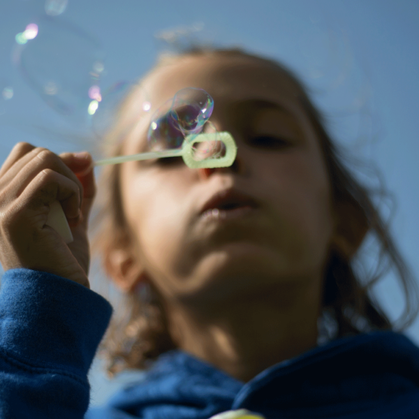 Natalia takes a deep breath and blows bubbles. Join our campaign to keep children like Natalia safe from the dangers of toxic air. Photo: Unicef/2018/Sutton-Hibbert