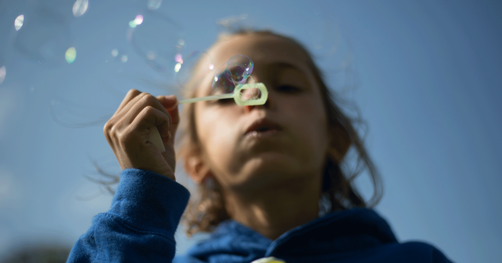 Natalia takes a deep breath and blows bubbles. Join our campaign to keep children like Natalia safe from the dangers of toxic air. Photo: Unicef/2018/Sutton-Hibbert