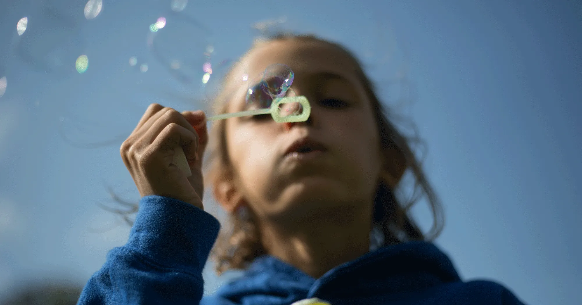 Natalia takes a deep breath and blows bubbles. Join our campaign to keep children like Natalia safe from the dangers of toxic air. Photo: Unicef/2018/Sutton-Hibbert