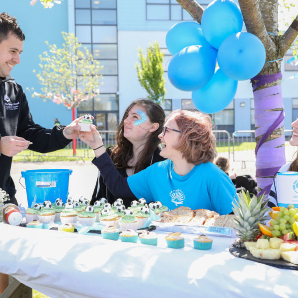 Group of children holding a bake sale at school