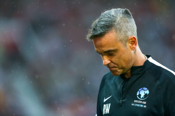 Robbie during the warm up at Soccer Aid for UNICEF 2018