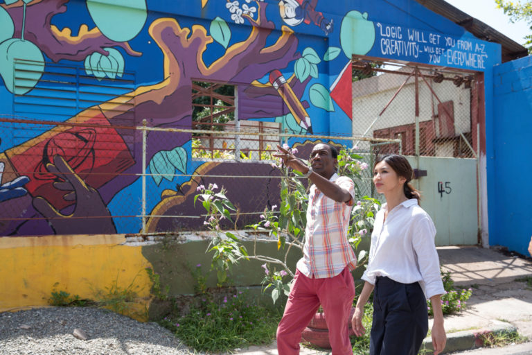 Gemma Chan meets with Andrew Payne A Violence Interrupter, down town Kingston Jamaica