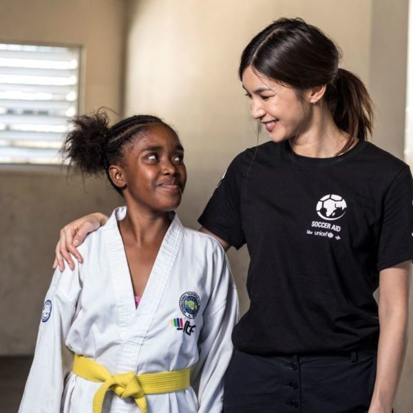 Gemma Chan in Jamaica at Unicef funded project Fight for Peace