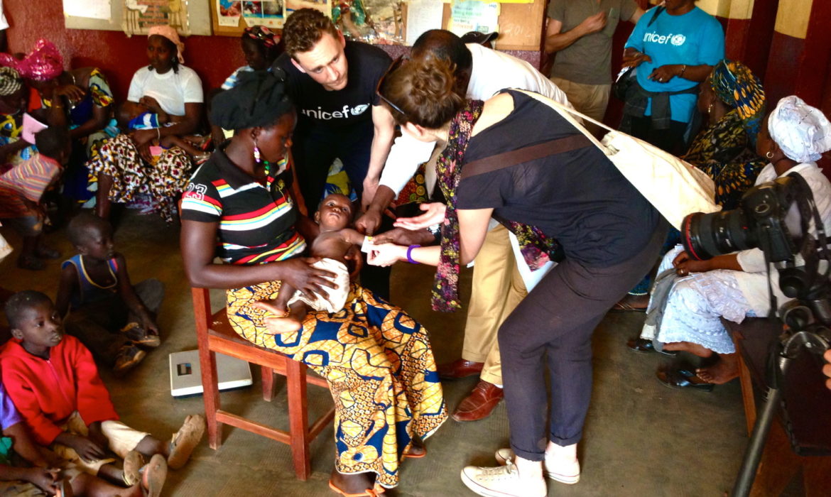 UNICEF UK Ambassador Tom Hiddleston at the Centre de Sante in Mandiana, a remote village in eastern Guinea.