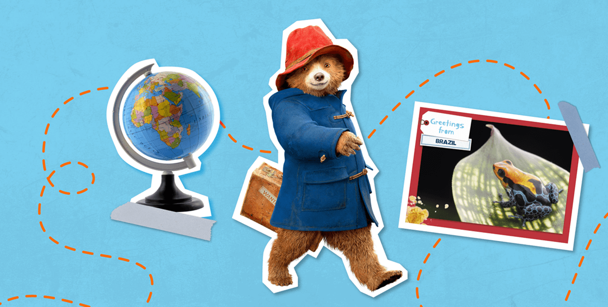 Paddington carrying his suitcase against a blue background with a globe and a postcard from Brazil.