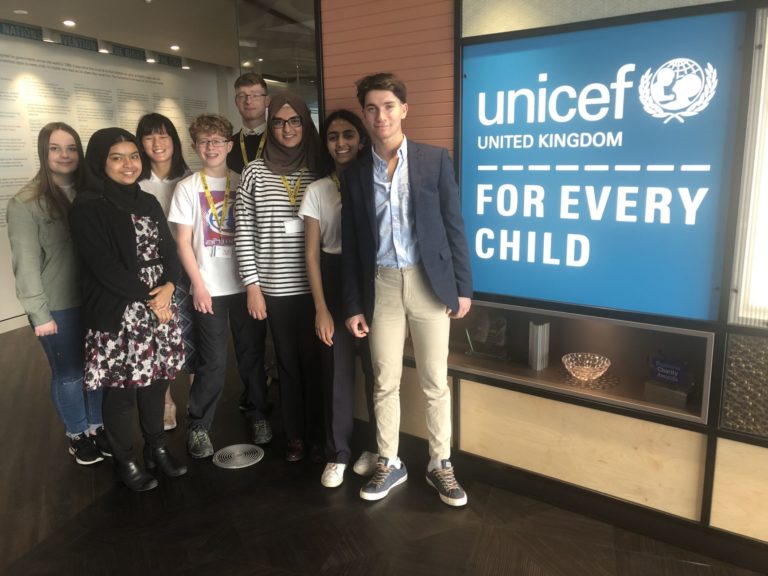 Unicef UK's Youth Advisory Board stand in the Unicef UK reception area