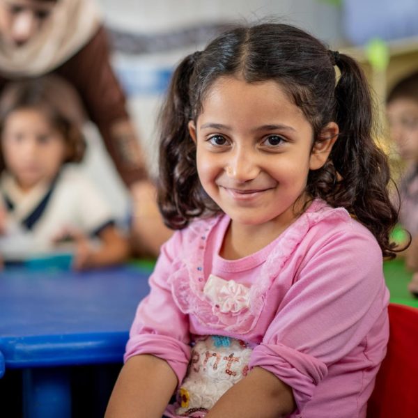 Girl in classroom in Jordan. UNICEF/Herwig
