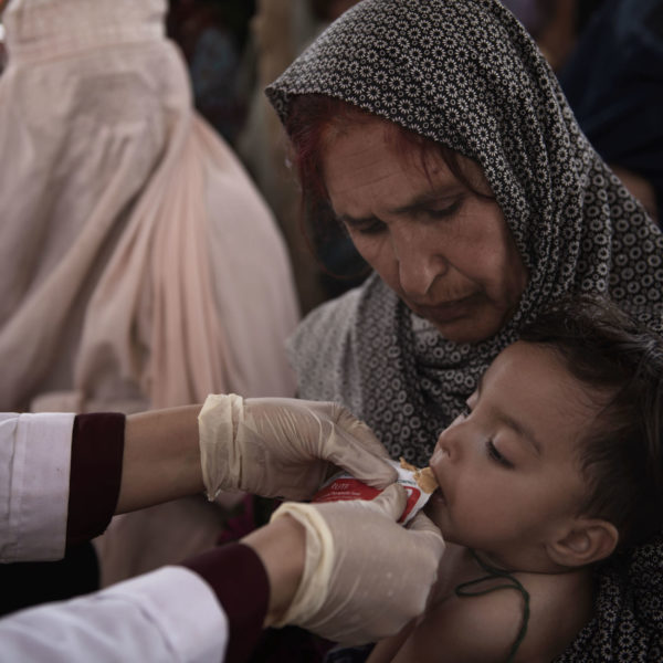 Afghanistan, Kandahar: Share Mohammad, 3, is paraplegic and his family is extremely poor.