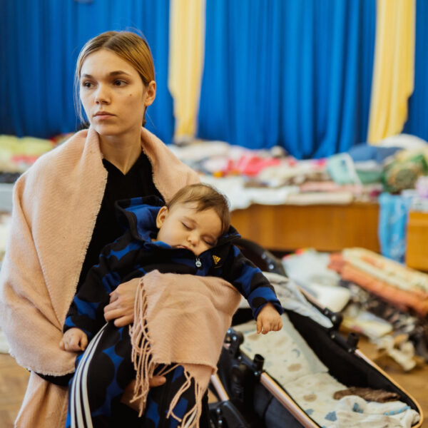 Mother holding her child in an air raid shelter in Lviv