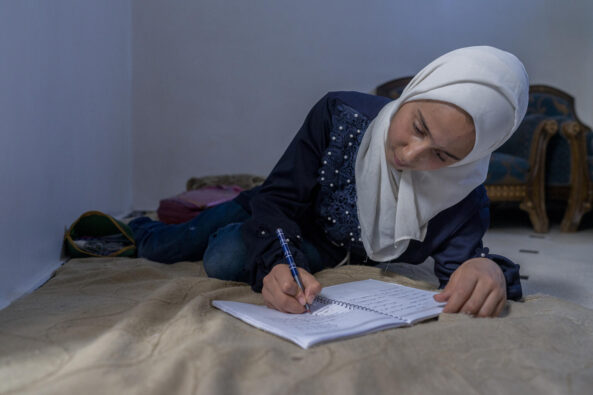 Nahla, 14, studies at home in Aleppo city, north Syria, on 19 August 2022. “No matter what, I never want to miss out on learning again,” said Nahla, 14. She had to drop out of school in 2019 when she was in Grade 6. She had to start working with her five sisters in her father’s carpentry shop to help her family of eight earn a living. “I’m happy to help my father. He only has us to rely on,” said Nahla. She was quick to learn the trade and after four years of working at the workshop, she began to run the place with her father. In May 2022, Nahla heard from relatives about the UNICEF -supported ‘curriculum B’ programme. The programme allows children to combine two academic years in one and catchup on missed learning. The programme provided Nahla an opportunity to resume her education. Something she had always wished for. Excited and determined to continue learning, Nahla enrolled with her sister Fatima in Level 1 of UNICEF’s ‘Curriculum B’ summer programme at the school nearby their home. “I was worried because it had been a while since I had been to school. I didn’t have friends there, and I had forgotten many things I had learned in the past. But it all turned out to be fine,” she said. “The teachers explained the topics well, and I was able to follow the classes,” Nahla added. She also made friends with other students in the programme. https://www.unicef.org/syria/stories/girl-power-making-difference