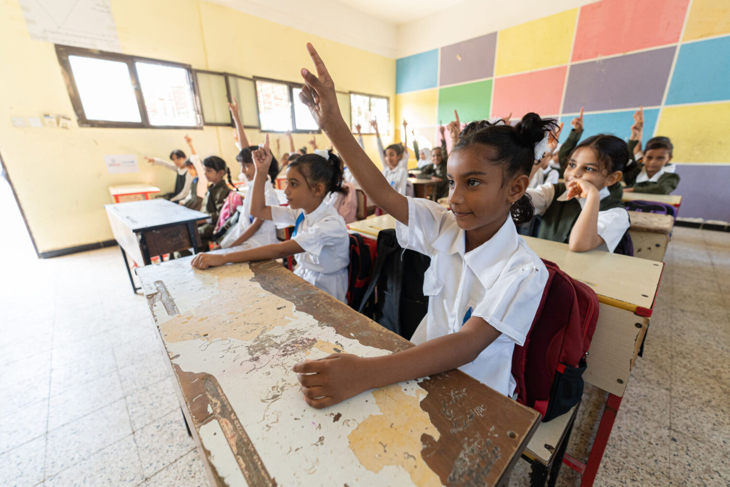 Shooq, a 9-year-old third grader, attends her class in Yemen