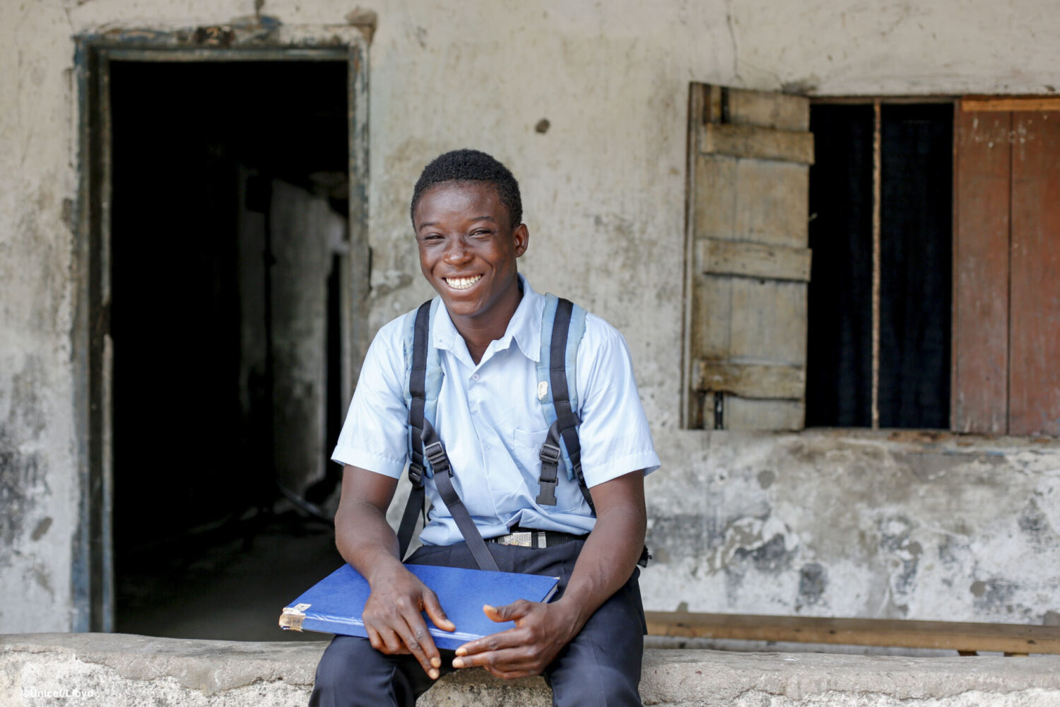 Munda, 17 years old outside the house he lives with his Uncle in Bo district, Sierra Leone