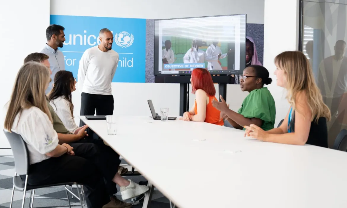 colleagues at UNICEF UK in a meeting