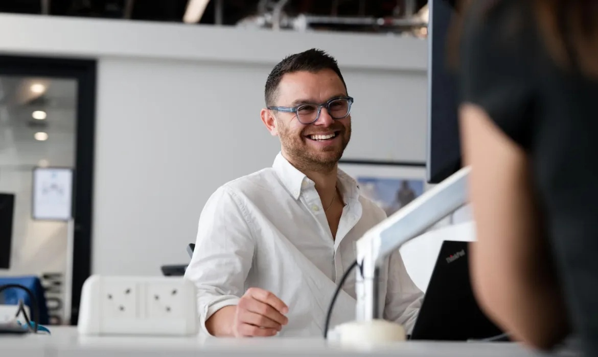 a male employee from UNICEF UK smiling
