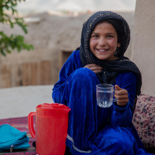 A girl drinking clean water.