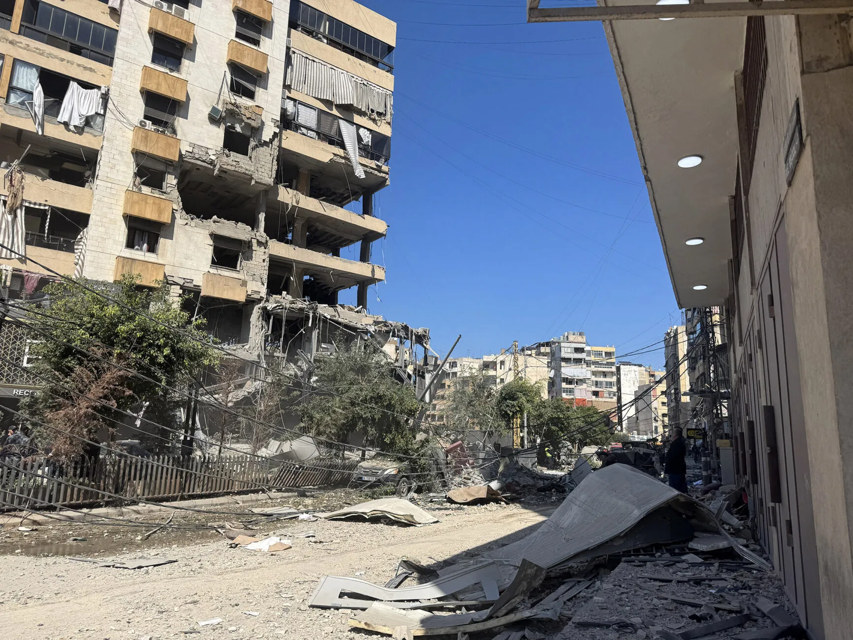 destruction of a building in lebanon.