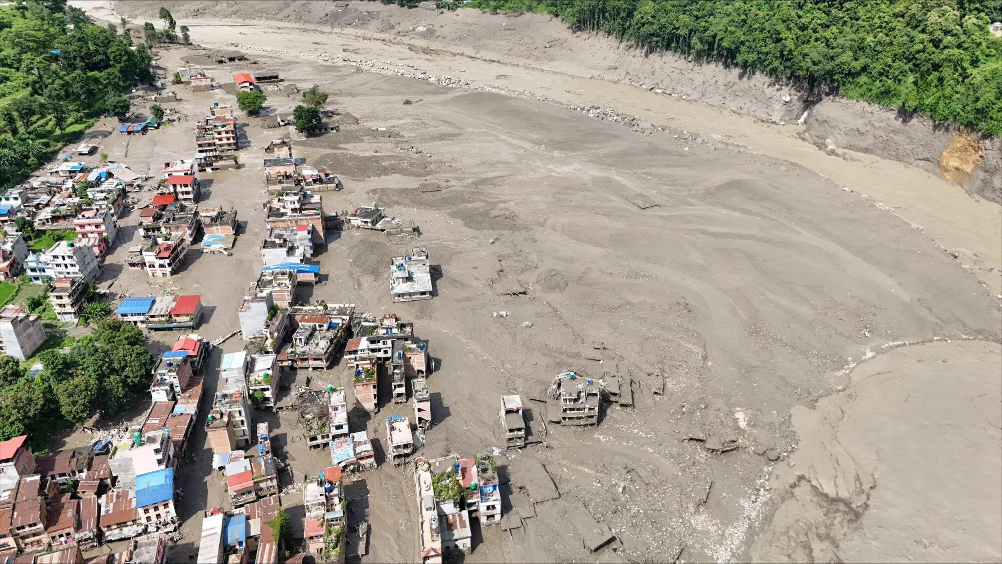 A birds-eye view of settlements in central northern Nepal covered in mud following the devastating flash floods that swept through the area on 26 August.